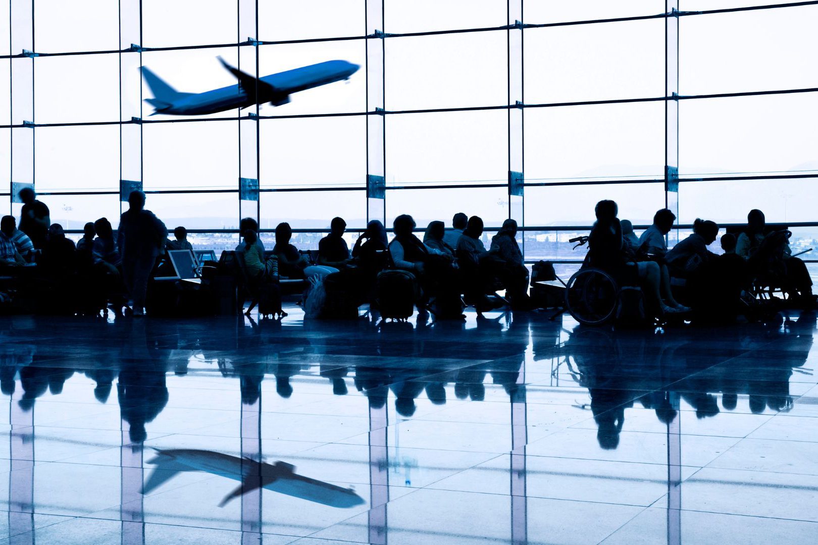 passengers-sitting-at-airport-gate